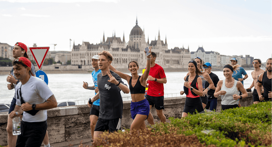 Runners warming up together in Budapest ahead of the LatteRace half marathon